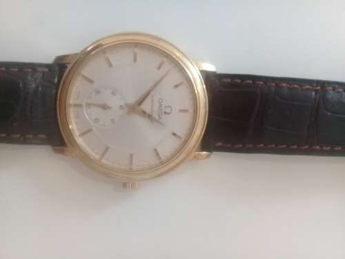 Omega Chronometer 18k Gold with original international warranty and box bought in Geneve 1997